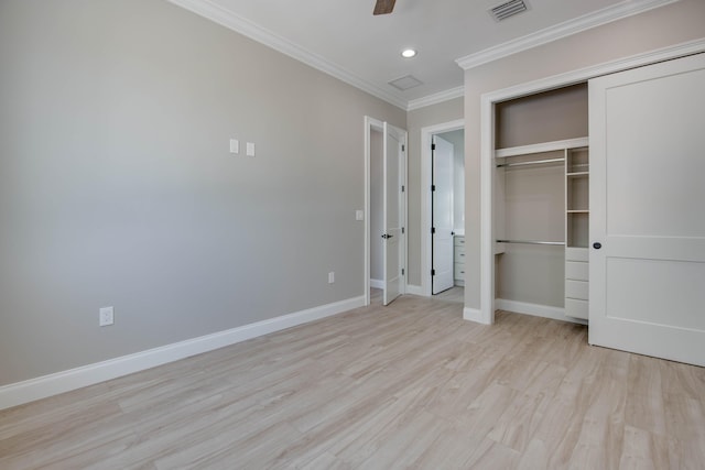 23066 Tarpon Ln, Cudjoe, FL 33042 - unfurnished bedroom with light wood-type flooring, crown molding, recessed lighting, baseboards, and a closet