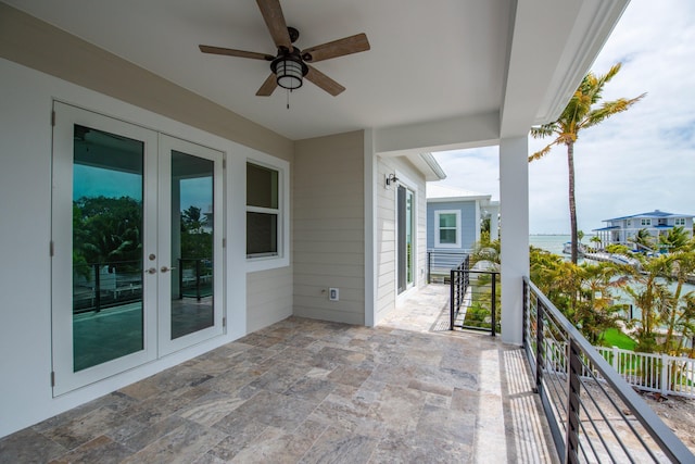 23066 Tarpon Ln, Cudjoe, FL 33042 - balcony with french doors and ceiling fan