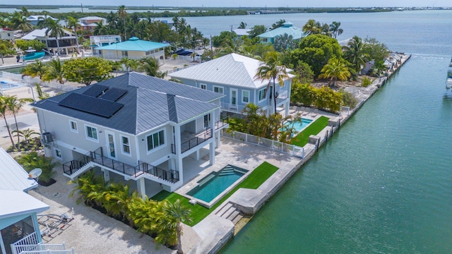 23066 Tarpon Ln, Cudjoe, FL 33042 - view from above of property featuring a pool and a nearby body of water