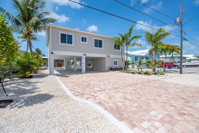 23066 Tarpon Ln, Cudjoe, FL 33042 - view of front of house with a carport and driveway