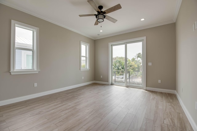 23066 Tarpon Ln, Cudjoe, FL 33042 - spare room with a ceiling fan, crown molding, light wood-style flooring, baseboards, and recessed lighting
