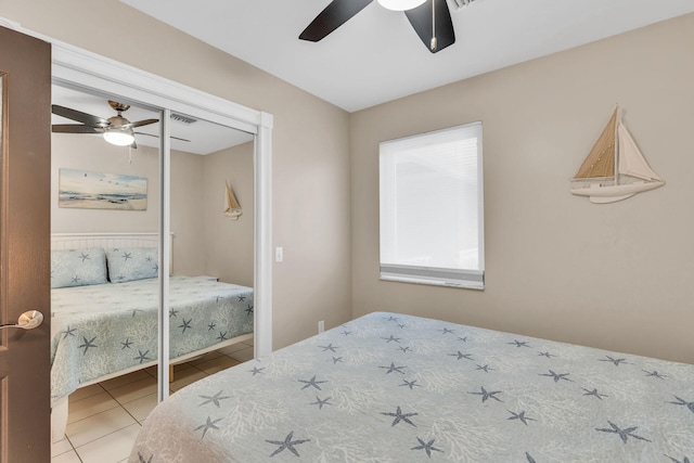 918 W Ocean Dr, Key Colony, FL 33051 - tiled bedroom featuring ceiling fan