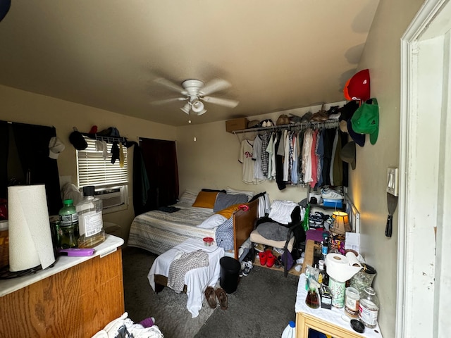 bedroom with ceiling fan and carpet floors