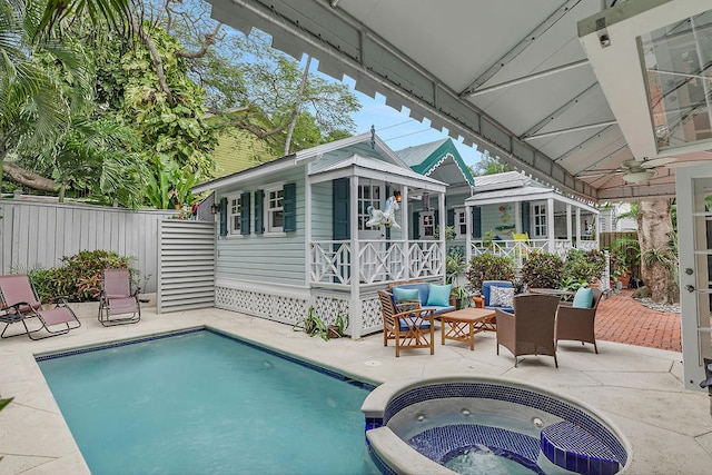 view of pool featuring an outbuilding, ceiling fan, a patio, and central air condition unit