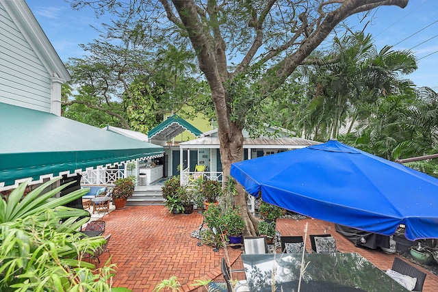 view of patio / terrace with an outdoor structure