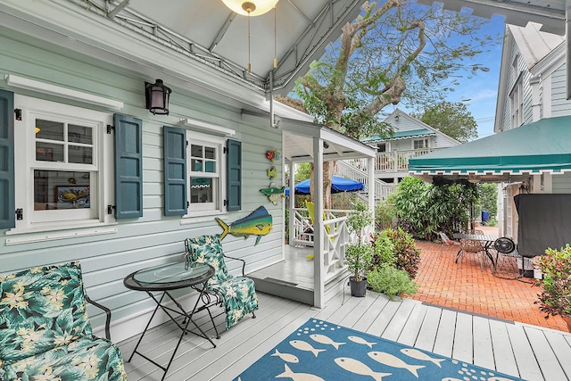 wooden deck featuring a gazebo