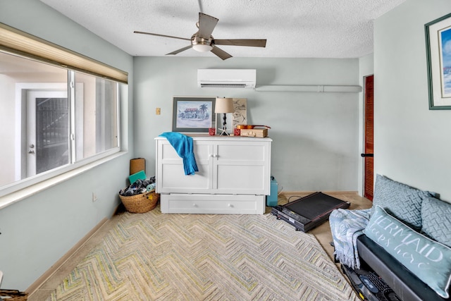 175 Galleon Rd, Islamorada, FL 33036 - sitting room with a wall mounted air conditioner, light carpet, ceiling fan, and a textured ceiling