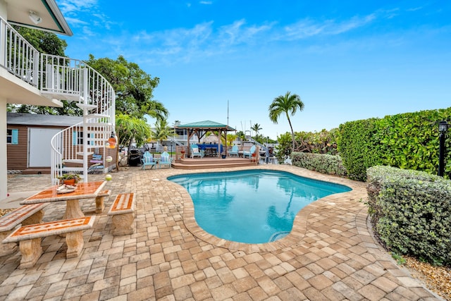 175 Galleon Rd, Islamorada, FL 33036 - view of pool with a gazebo, a patio, stairs, and a storage unit