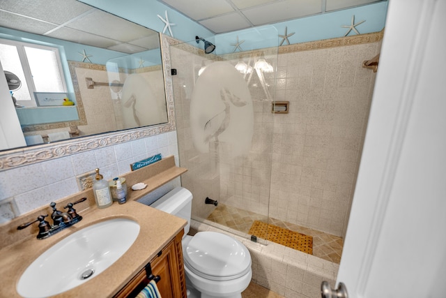 175 Galleon Rd, Islamorada, FL 33036 - full bathroom with a walk in shower, vanity, tile walls, and a drop ceiling