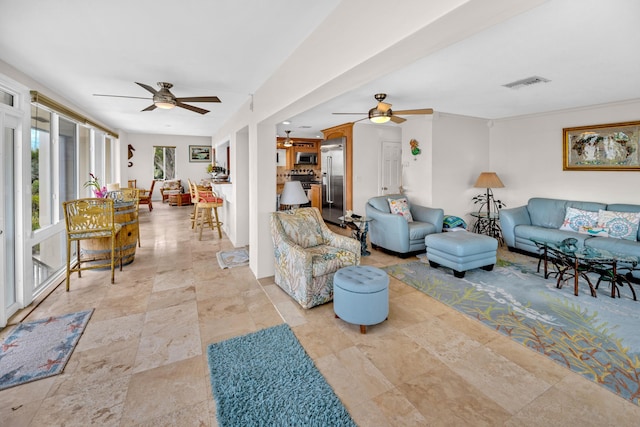 175 Galleon Rd, Islamorada, FL 33036 - living room featuring ceiling fan and stone finish flooring