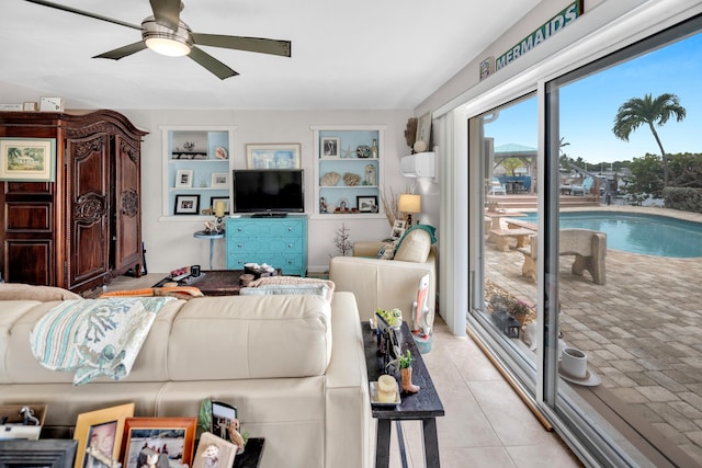 175 Galleon Rd, Islamorada, FL 33036 - living area featuring ceiling fan, built in shelves, and light tile patterned floors