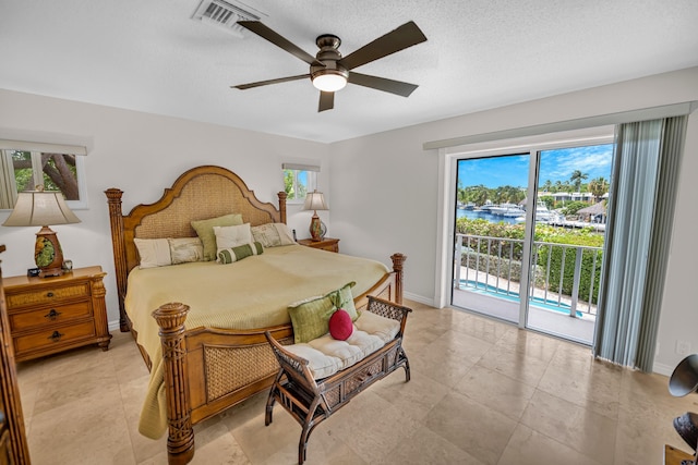 175 Galleon Rd, Islamorada, FL 33036 - bedroom with access to outside, multiple windows, ceiling fan, and a water view