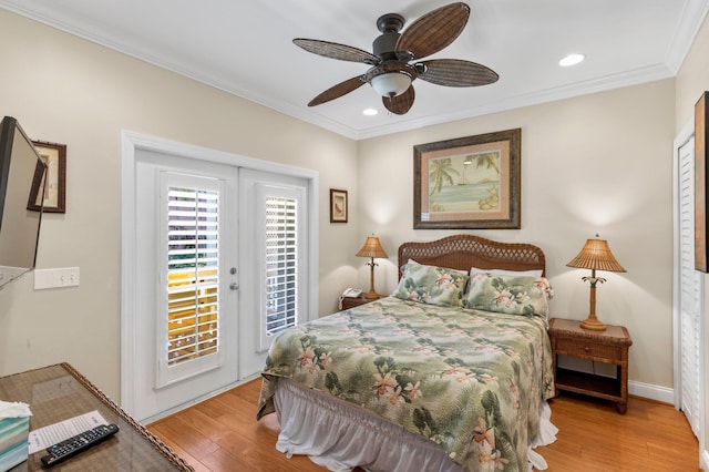 bedroom featuring baseboards, access to exterior, crown molding, light wood-type flooring, and recessed lighting