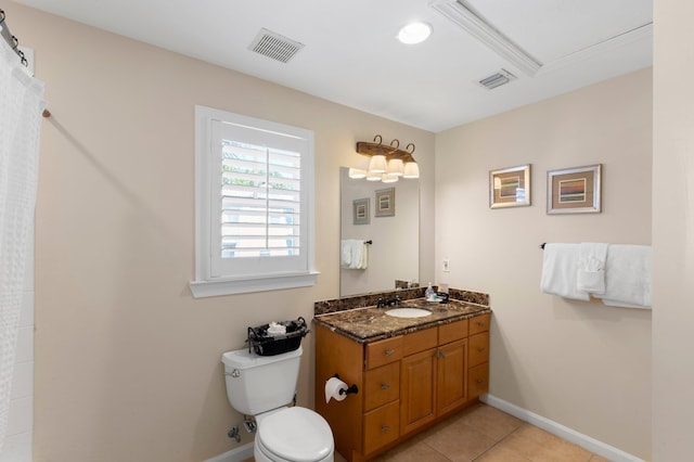 full bathroom featuring toilet, baseboards, visible vents, and vanity