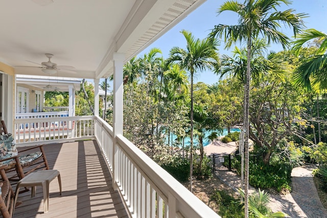 balcony featuring a ceiling fan