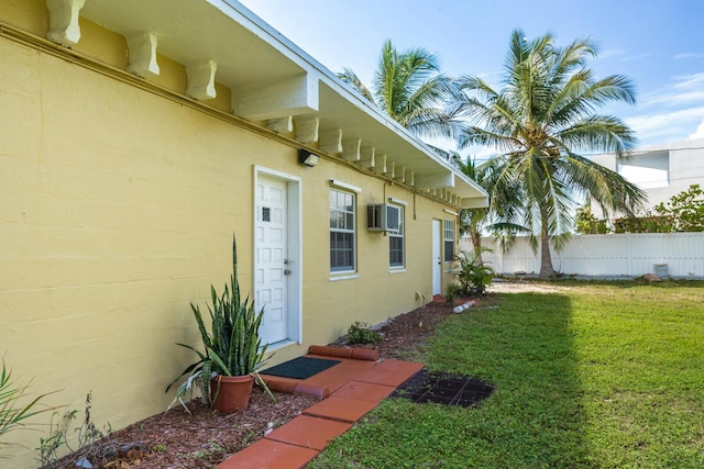 exterior space featuring a wall unit AC