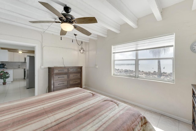 tiled bedroom with ceiling fan, stainless steel fridge, and beam ceiling