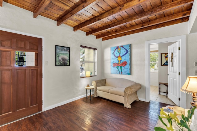 entryway featuring hardwood / wood-style flooring, wooden ceiling, and a healthy amount of sunlight