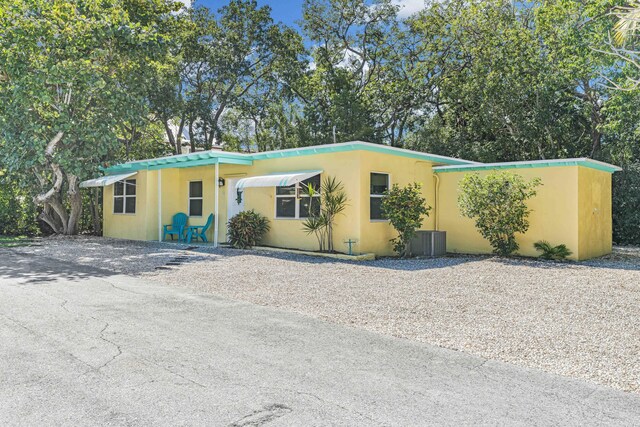 view of front of house featuring central AC unit