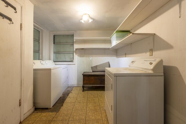 laundry area with washing machine and dryer