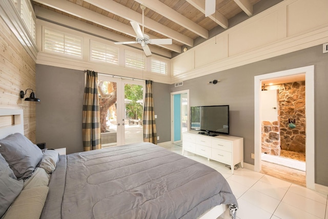 bedroom featuring visible vents, beamed ceiling, access to exterior, french doors, and light tile patterned flooring