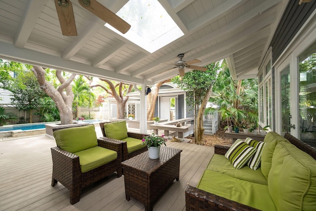 wooden deck featuring a fenced backyard, a ceiling fan, an outdoor hangout area, and a fenced in pool