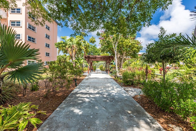 view of home's community featuring a pergola