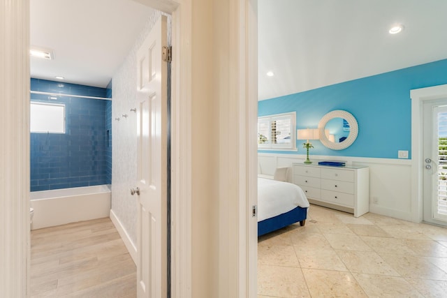 bedroom featuring multiple windows and recessed lighting