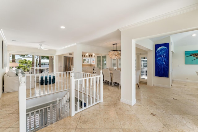 hallway featuring ornamental molding, an upstairs landing, baseboards, and recessed lighting