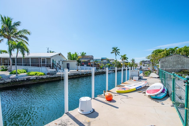 dock area featuring a water view