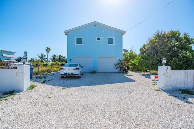 view of home's exterior featuring a garage
