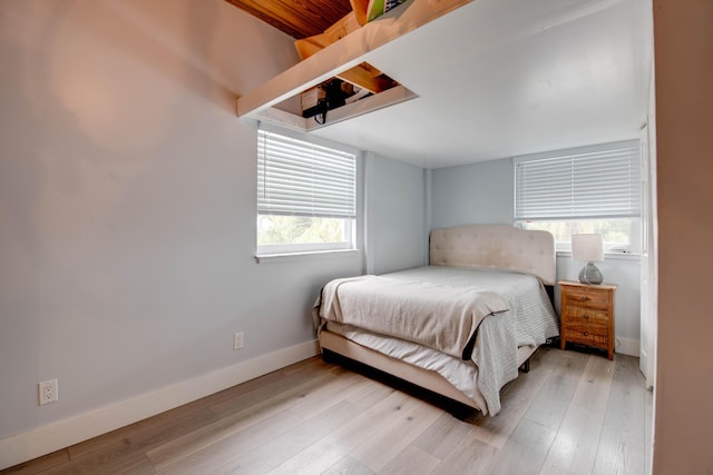 bedroom with light hardwood / wood-style flooring
