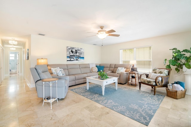 19 N Dr, Key Largo, FL 33037 - living room featuring a ceiling fan and baseboards
