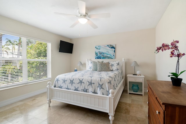 19 N Dr, Key Largo, FL 33037 - bedroom with baseboards and a ceiling fan