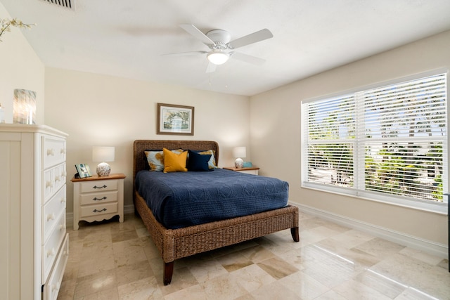 19 N Dr, Key Largo, FL 33037 - bedroom with baseboards and ceiling fan