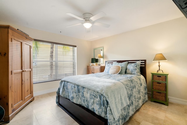 19 N Dr, Key Largo, FL 33037 - bedroom with baseboards and a ceiling fan