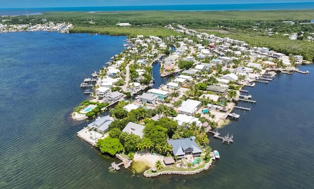 19 N Dr, Key Largo, FL 33037 - aerial view of property's location with a nearby body of water and nearby suburban area