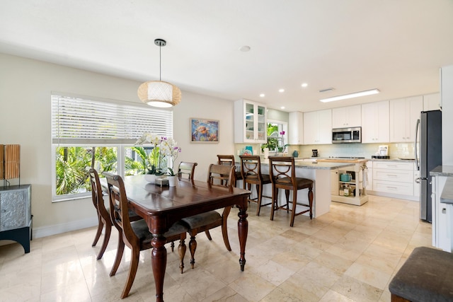 19 N Dr, Key Largo, FL 33037 - dining area with baseboards and recessed lighting