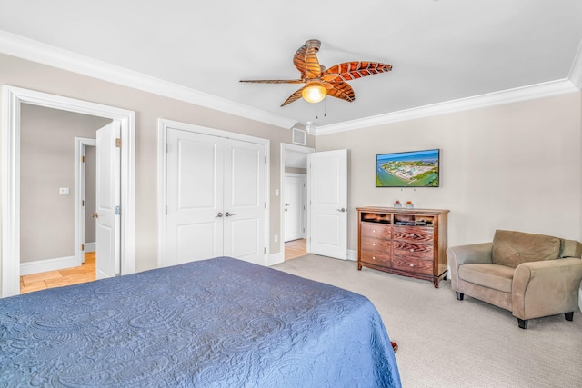2394 Coco Plum Dr Unit 2, Marathon, FL 33050 - carpeted bedroom with crown molding, a ceiling fan, and a closet