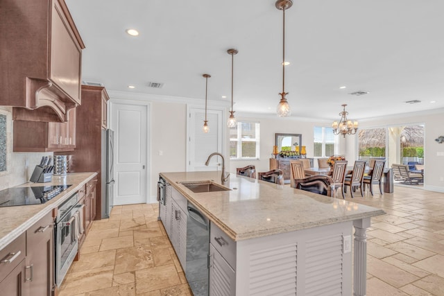 2394 Coco Plum Dr Unit 2, Marathon, FL 33050 - kitchen with appliances with stainless steel finishes, stone tile floors, recessed lighting, a kitchen island with sink, and ornamental molding