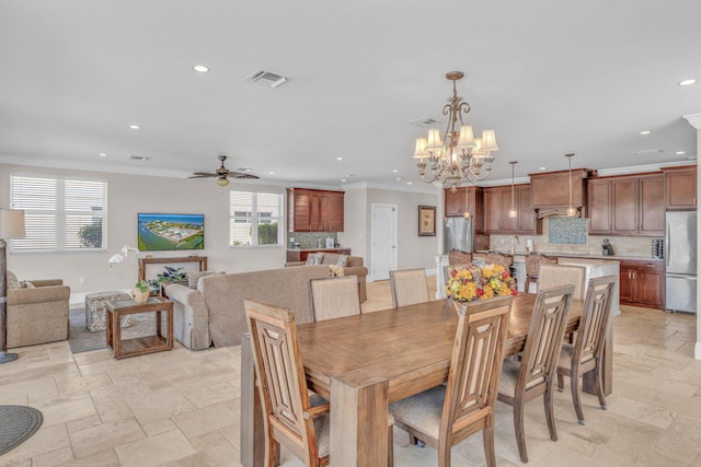 2394 Coco Plum Dr Unit 2, Marathon, FL 33050 - dining area with recessed lighting, a chandelier, ceiling fan, stone tile flooring, and ornamental molding