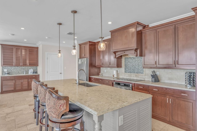 2394 Coco Plum Dr Unit 2, Marathon, FL 33050 - kitchen with stainless steel appliances, backsplash, recessed lighting, an island with sink, and a breakfast bar area