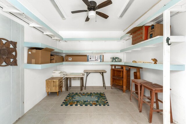 kitchen with ceiling fan and light tile patterned floors