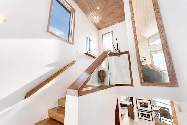 staircase featuring wooden ceiling