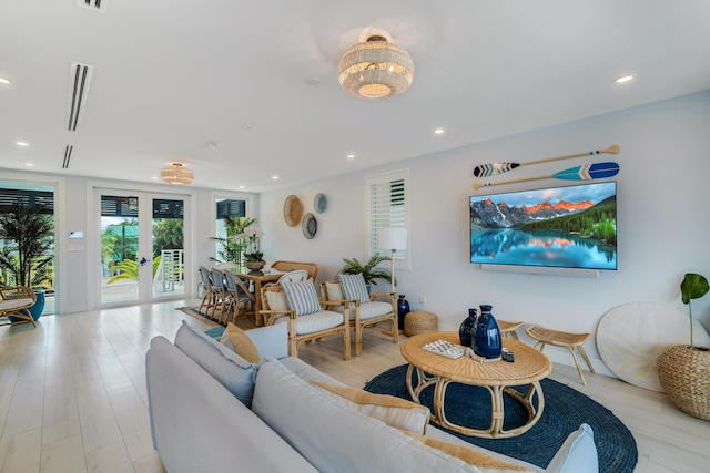 16745 Tamarind Rd, Sugarloaf, FL 33042 - living room featuring recessed lighting, light wood-style floors, and french doors