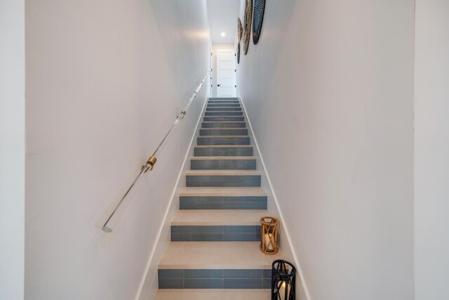 16745 Tamarind Rd, Sugarloaf, FL 33042 - stairway with a high ceiling