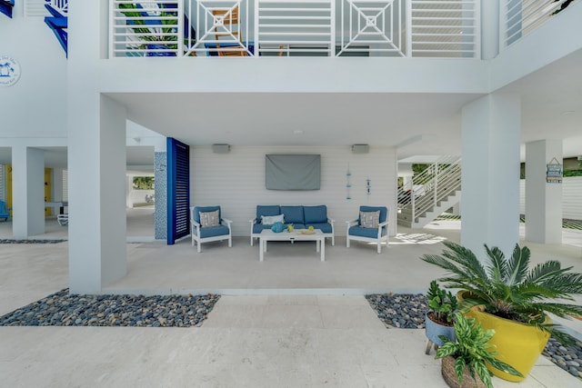 16745 Tamarind Rd, Sugarloaf, FL 33042 - view of patio / terrace featuring an outdoor living space and stairs