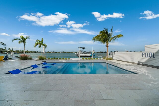 16745 Tamarind Rd, Sugarloaf, FL 33042 - outdoor pool featuring a patio area