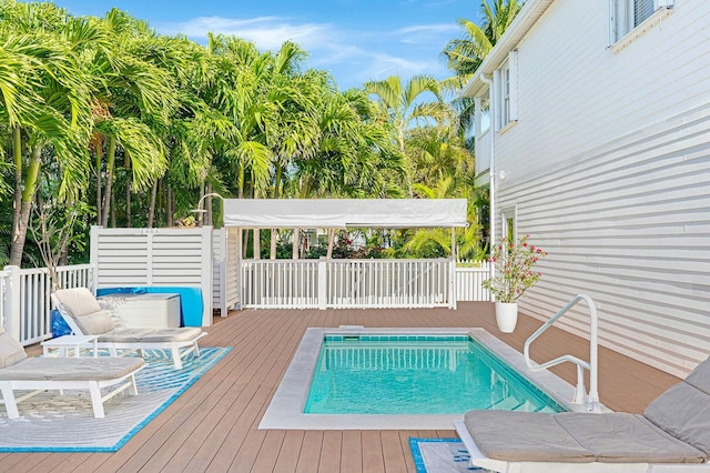 outdoor pool with a deck