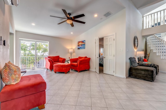 tiled living room with high vaulted ceiling and ceiling fan